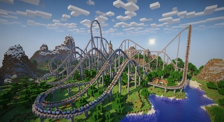 Minecraft roller coaster built with minecart rails, powered rails, and redstone inside a player-made theme park